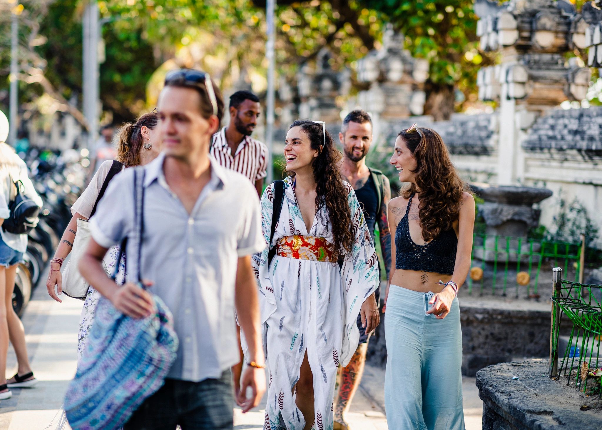 Group of happy travelers enjoying a destination walk
